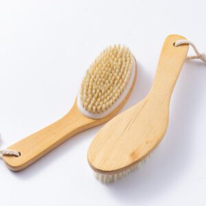 A natural wood brush with soft bristles, designed for gentle exfoliation and improving skin health.