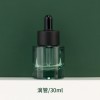 Green Cylinder Thick Bottom Skincare Glass Packaging Set. Cosmetic Products Bottles