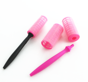 Self-adhesive hair roller with pins