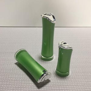 empty personalized green acrylic shampoo bottle