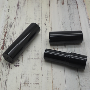 Custom printed logo shiny black empty round lipbalm lipstick tube