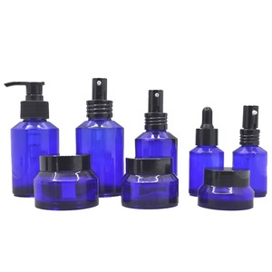 high end  frosted matte black cosmetic glass bottle and jar pump bottle for lotion serum cream full set