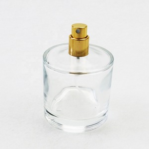 Glass bottle cosmetic 100ml cylinder personalized perfume bottle with easy crimp pump