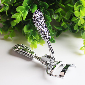 Gold diamond handle eyelash curler