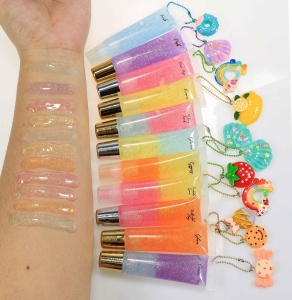 Lip gloss base Wholesale Clear kid 55 colors squeezed tube packaging private label fruit flavour glitter nude lip gloss makeup