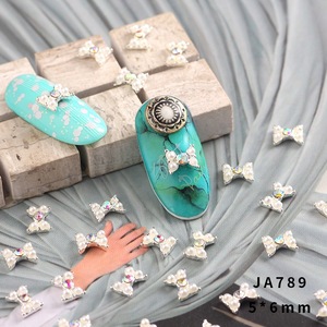 Hot sale charming gold alloy nail art design 3d nail art rhinestones bow tie jewelry JA781