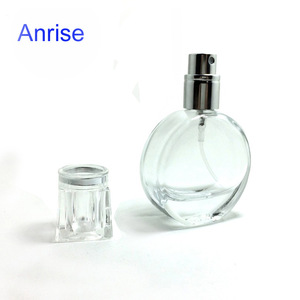 STOCK Elegant 25ml Oval Shape Clear Glass Perfume Bottle Refillable Pump Atomizer Bottle with Sprayer and Clear Caps