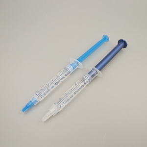 tooth whitening kits with teeth whitening gel syringe and mini teeth whitening led light