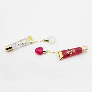 Small Cute Transparent Lip Balm Squeeze Tube Liquid Moisturizing Waterproof  Magic Clear Pendant Shiny Lip Gloss - Yiwu Shinuo Cosmetics Co., Ltd.