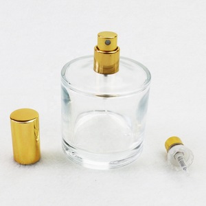 Glass bottle cosmetic 100ml cylinder personalized perfume bottle with easy crimp pump