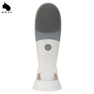 2 in 1 IPX7 Waterproof sonic Silicone facial brush Bamboo fiber electric wash brush with heat massager function device