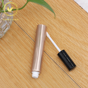 Lip gloss tube packaging customized plastic cosmetic tube with lip balm brush