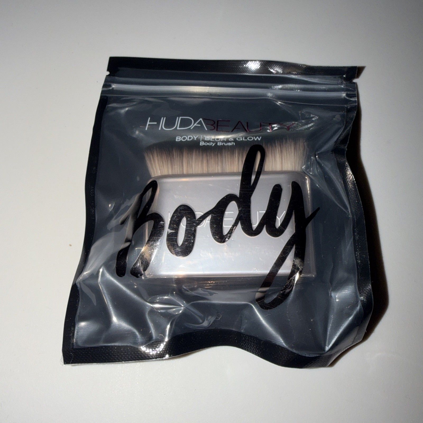Huda Beauty N.Y.M.P.H Body Blur and Glow Brush