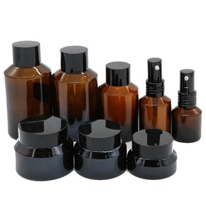 high end  frosted matte black cosmetic glass bottle and jar pump bottle for lotion serum cream full set