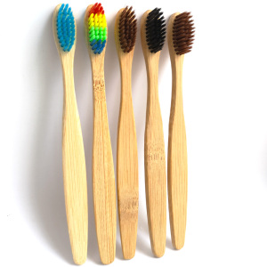 Biodegradable toothbrush with soft, reactive carbon bristles made of natural bamboo toothbrush