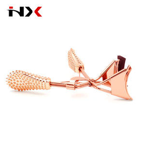 Rose Gold Color Heated Eyelash Curler with Acupressure Style Massage Plastic Handle