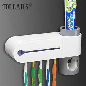 Toothbrush disinfector automatic toothpaste holder toothbrush holder