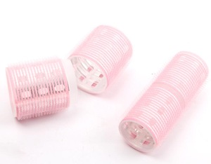 Self-adhesive hair roller with pins