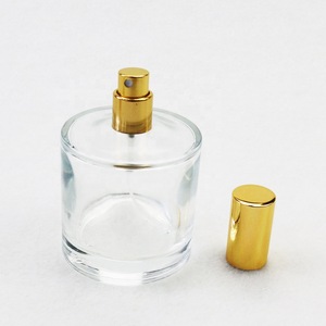 Glass bottle cosmetic 100ml cylinder personalized perfume bottle with easy crimp pump