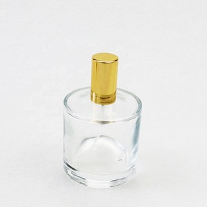 Glass bottle cosmetic 100ml cylinder personalized perfume bottle with easy crimp pump