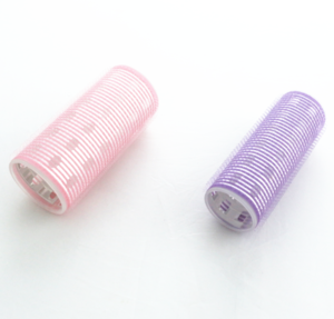 Self-adhesive hair roller with pins