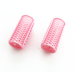 Self-adhesive hair roller with pins