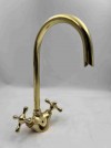 unlacquered brass faucet