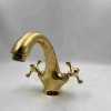 unlacquered brass faucet