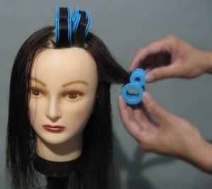 Blue plastic hair roller
