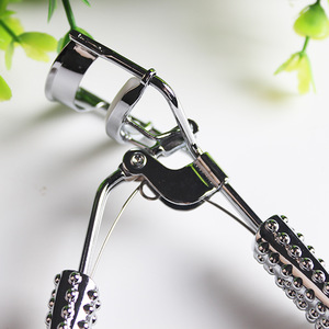 Gold diamond handle eyelash curler