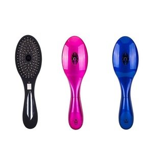 Portable travel cordless electric ionic comb