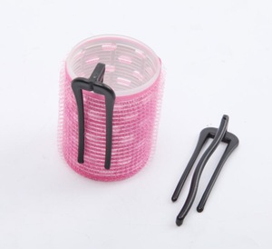 Self-adhesive hair roller with pins