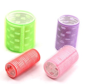 Self-adhesive hair roller with pins