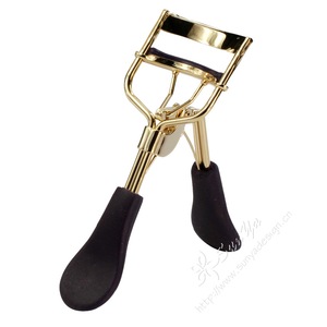 Gold plated eyelash curler with purple silicone handle